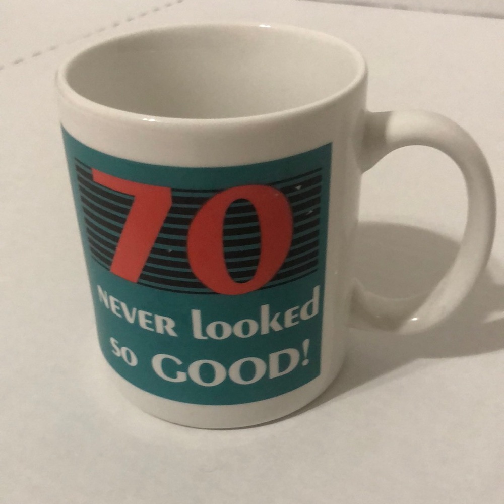 Double sided “70 never looked so good” porcelain coffee mug